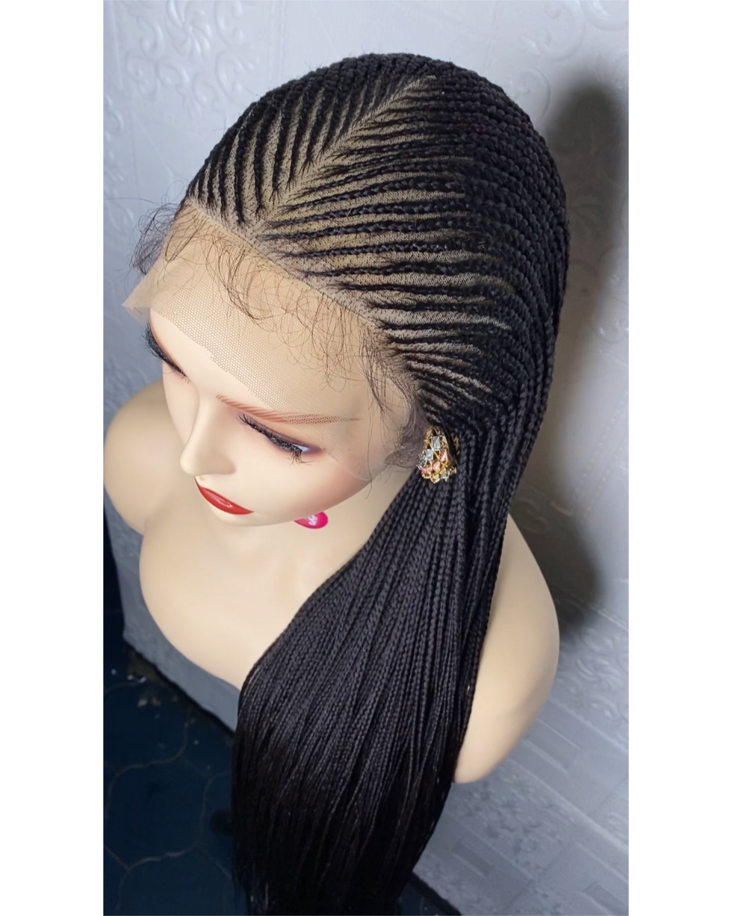 Defined center part cornrows