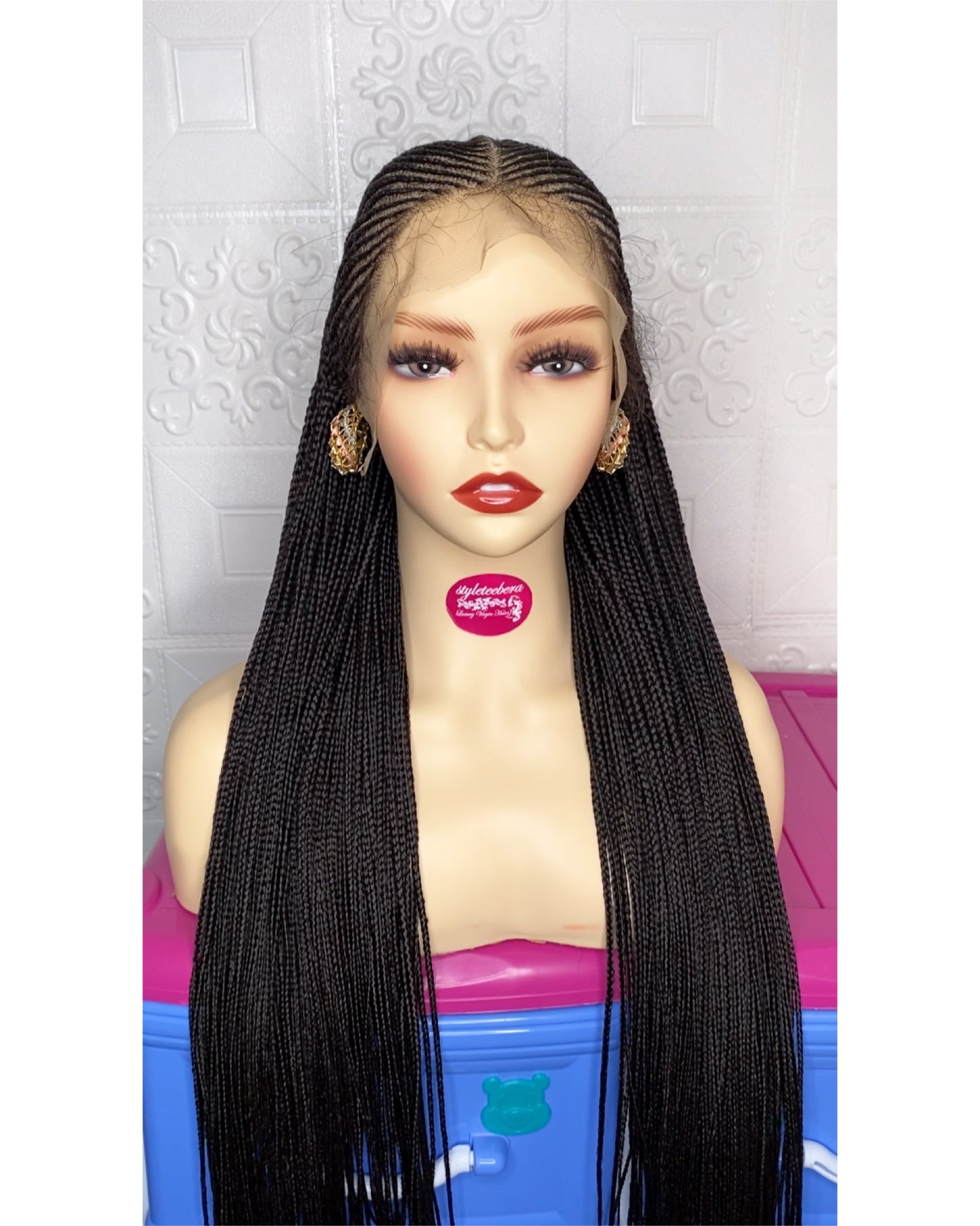 Defined center part cornrows